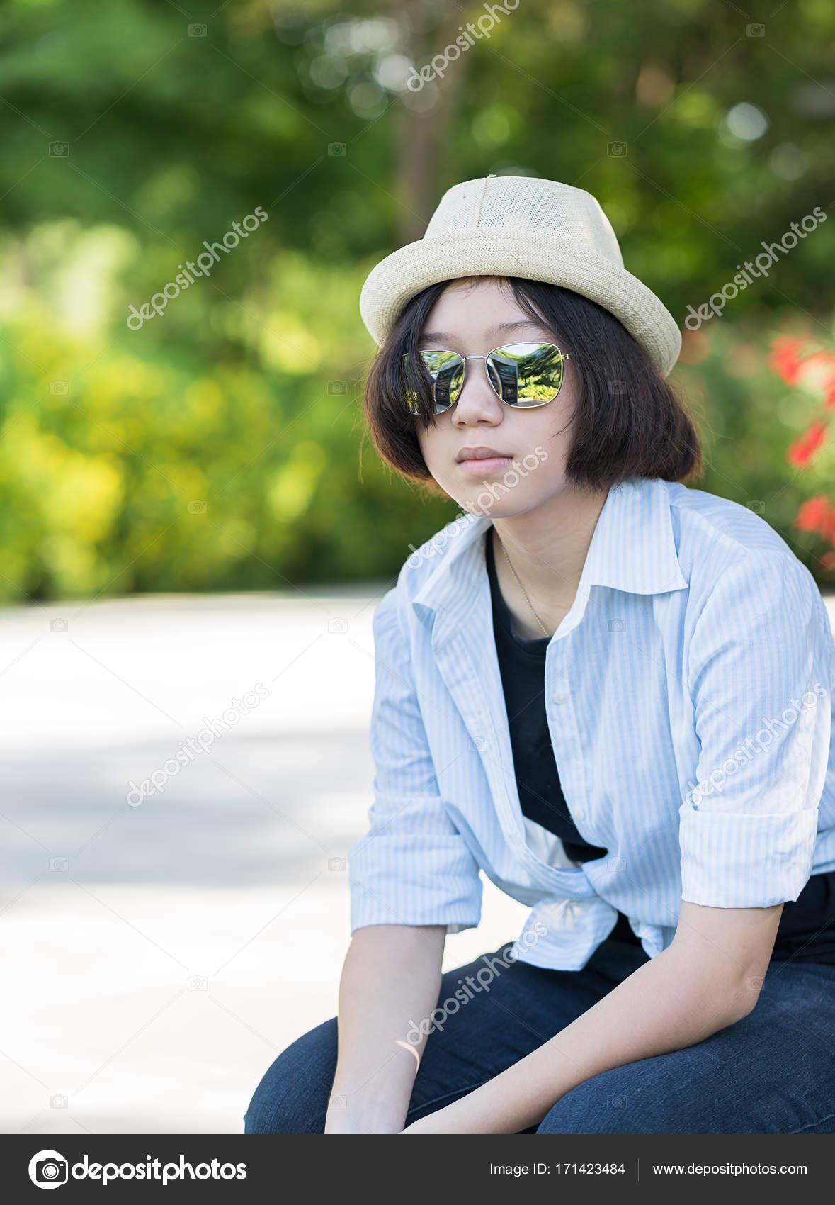 Women With Short Hair Wearing Hat In Park Stock Photo C Stoonn