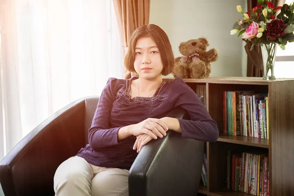 Young asian woman short hair relaxation in living room — Stock Photo, Image