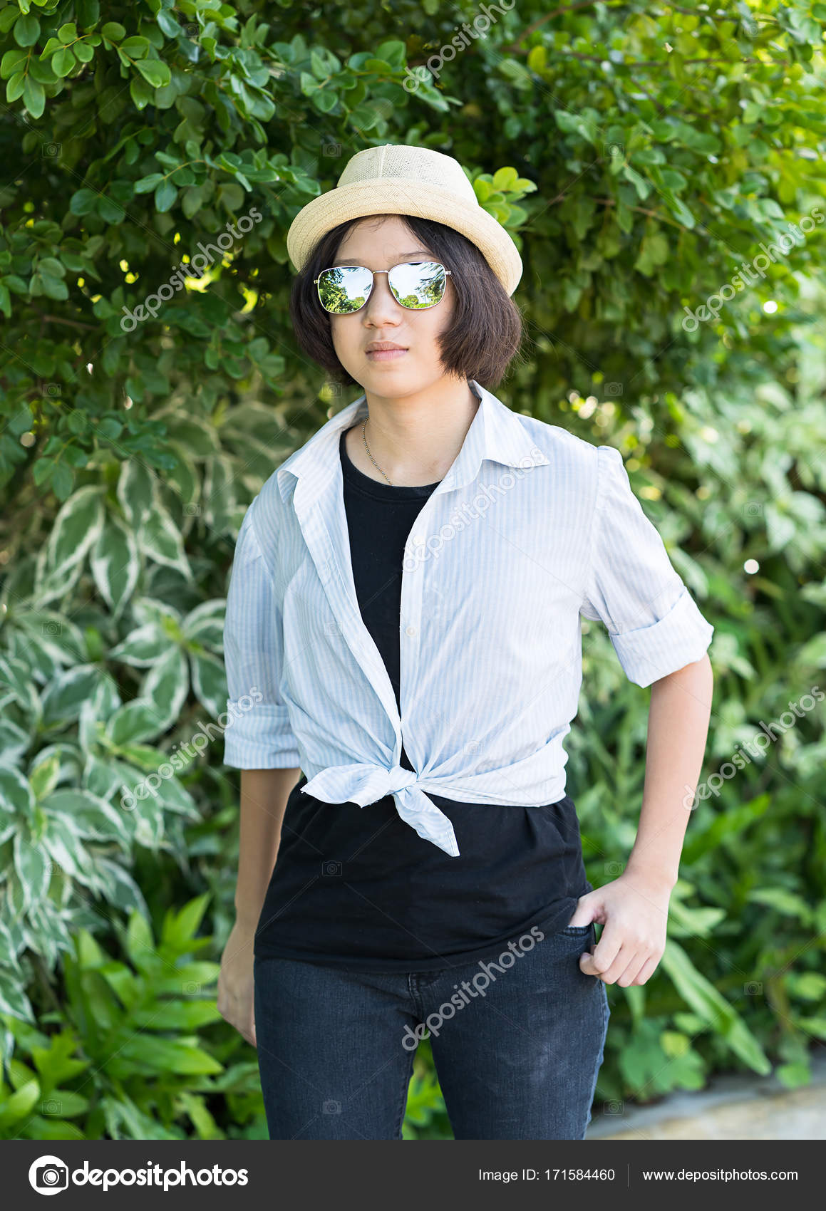 Women With Short Hair Wearing Hat In Park Stock Photo C Stoonn