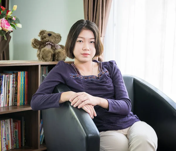 Young asian woman short hair relaxation in living room — Stock Photo, Image