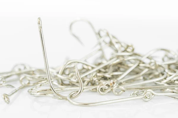 Pile of fish hook on a white — Stock Photo, Image