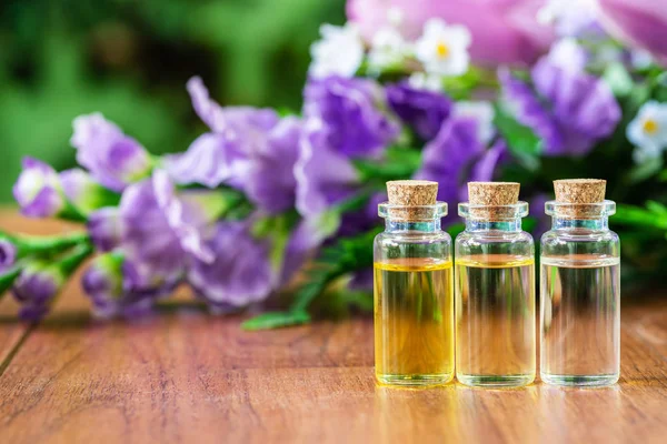 Glass bottle with essential oil — Stock Photo, Image