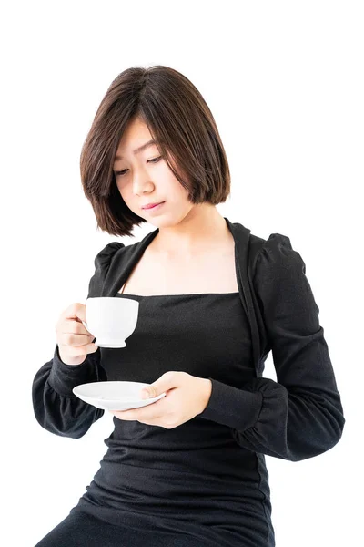 Woman holding coffee cup isolated on white — 스톡 사진