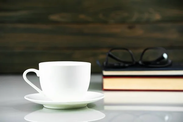 White cup of coffee and book — Stock Photo, Image
