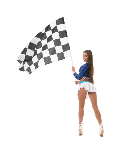 Back view of sexy brunette with checkered flag — Stock Photo, Image