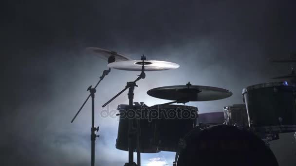 View of modern drum kit in smoky studio — Stock Video