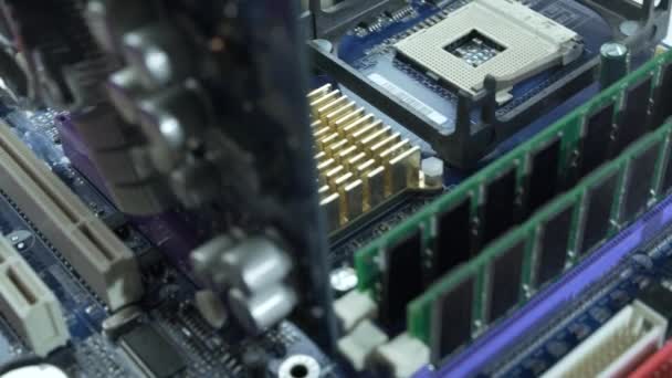 Processor into the motherboard socket, computer hardware — Stock Video