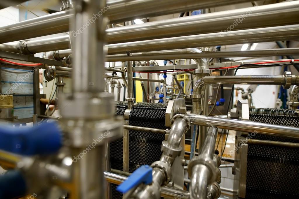 Dairy plant equipment at work close up shot — Stock Photo