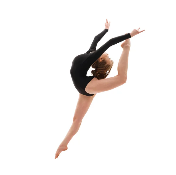 Молодая гимнастка в элегантной джамп-студии — стоковое фото