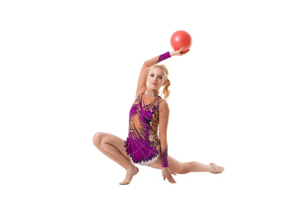 Pretty slim gymnast with red ball artistic portrait — Stock Photo, Image