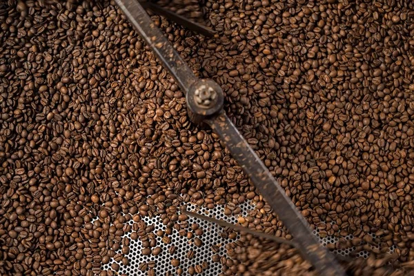 Mixing machine of coffee bean roaster at work — Stock Photo, Image