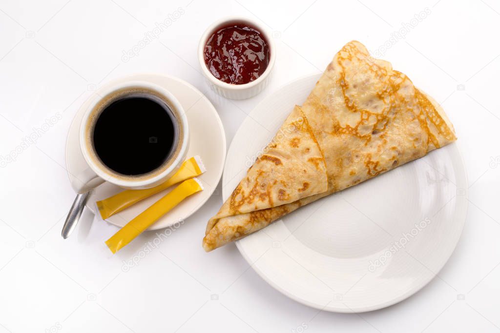 Breakfast with sweet crepe and coffee on white
