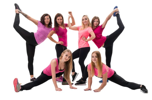 Jóvenes entrenadores de fitness con blusas y polainas brillantes —  Fotos de Stock