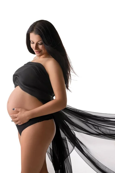 Belle brune enceinte tirée en sous-vêtements noirs — Photo