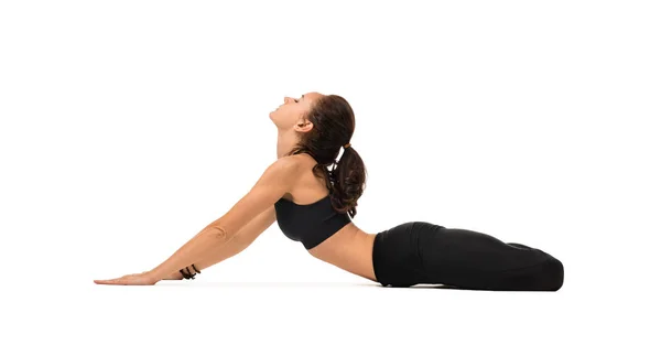 Jolie femme pratiquant le yoga tir isolé — Photo