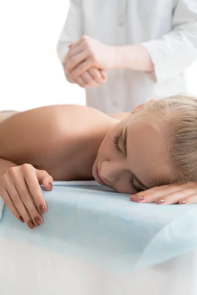 Male massagist making massage to blonde in spa — Stock Photo, Image