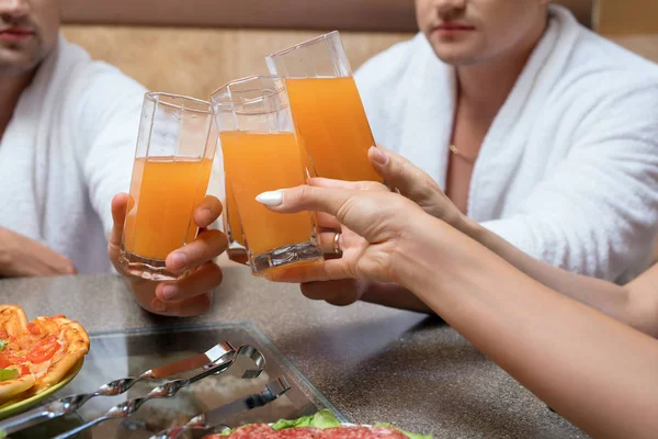 Fruit juice glasses on foregound croppped view — Stock Photo, Image