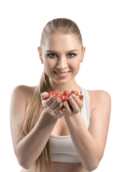 View of a beautiful young woman holding tomatoes — Stock Photo, Image
