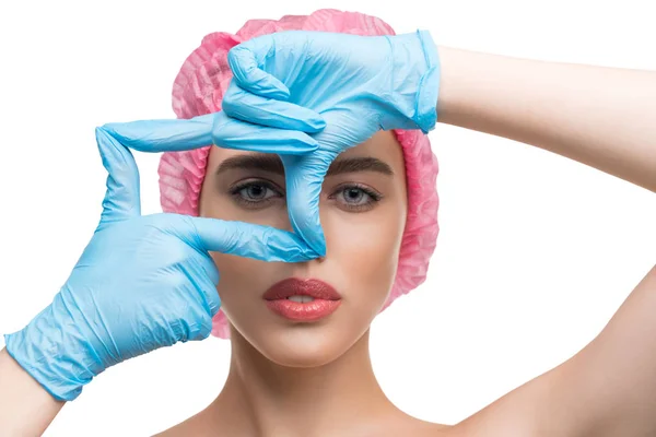 Woman in disposable cap and gloves isolated shot — Stock Photo, Image