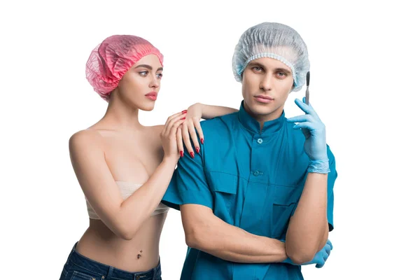 Bello chirurgo plastico con la sua paziente femminile — Foto Stock