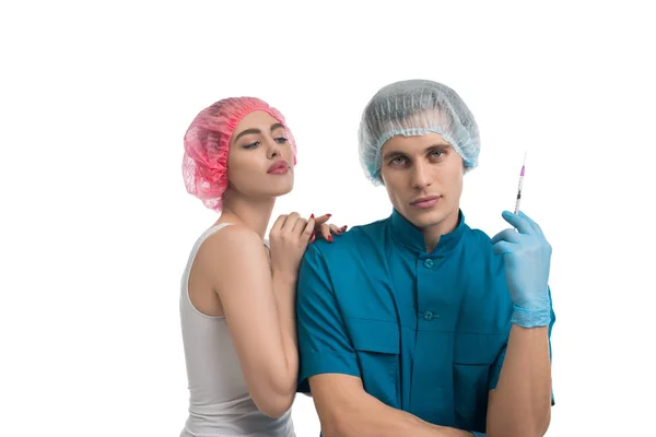 Cirujano plástico con su mujer bonita paciente — Foto de Stock