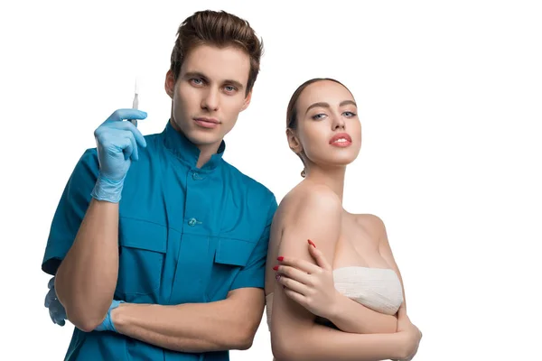 Plastic surgeon with his female patient portrait — Stock Photo, Image