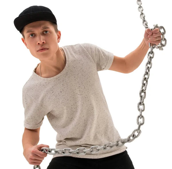 Young rap dancer with metal chain posing in studio — Stock Photo, Image