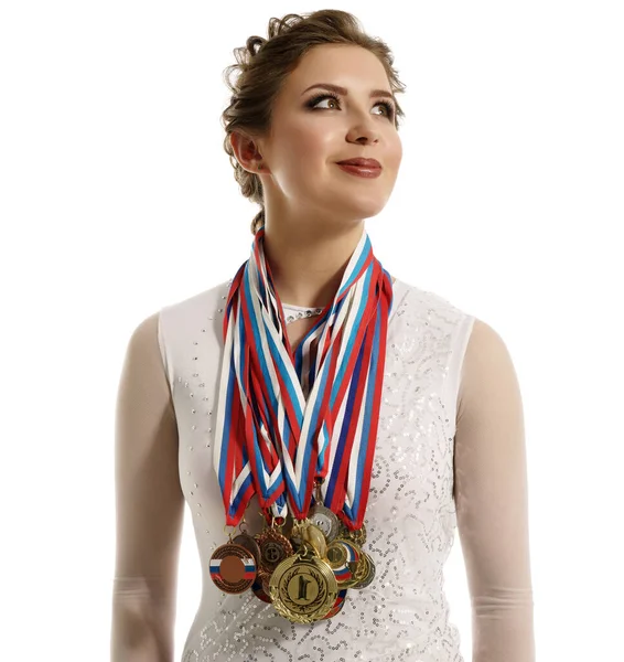 Charming gymnast with medals, isolated on white — Stock Photo, Image