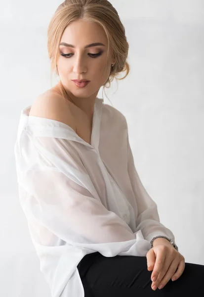 Woman in sexy white shirt studio portrait — Stock Photo, Image