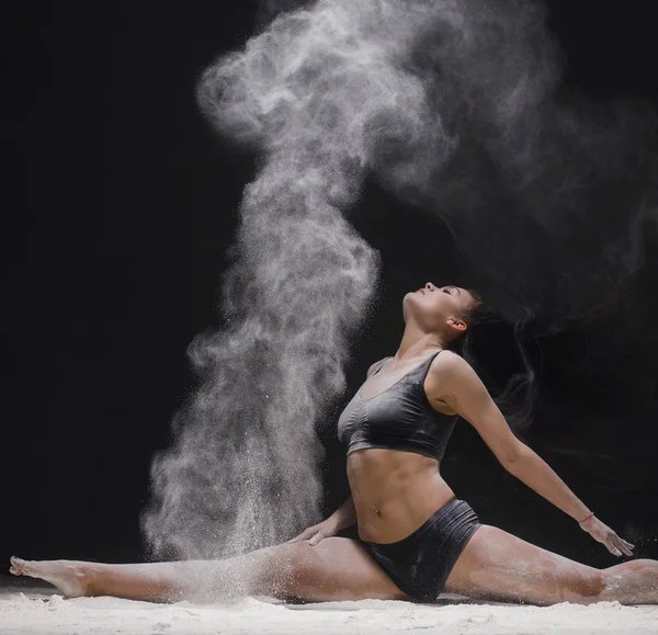 Woman in a split view in a white dust cloud — Stock Photo, Image