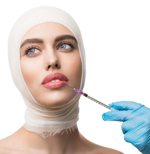 Girl her head bandaged getting beauty injections — Stock Photo, Image