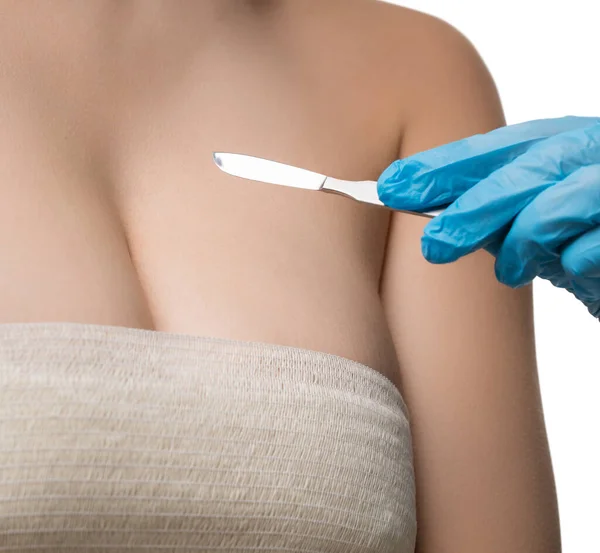 Girl her breast bandaged at medical examination — Stock Photo, Image