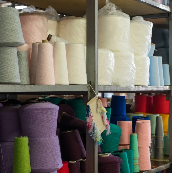 Spools with threads at knitting factory view — Stock Photo, Image