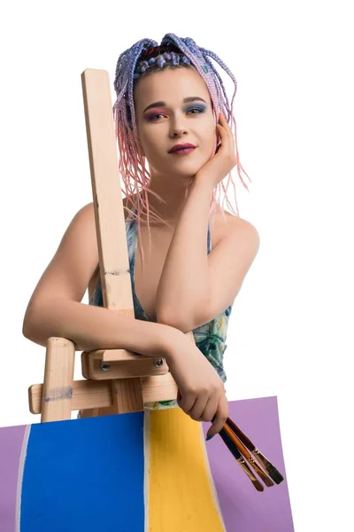 Sexy woman in sportswear near easel view — 스톡 사진