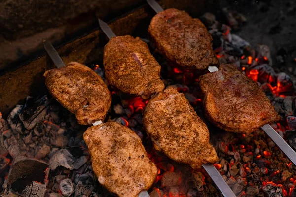 Meat being prepaired open air view — Stock Photo, Image