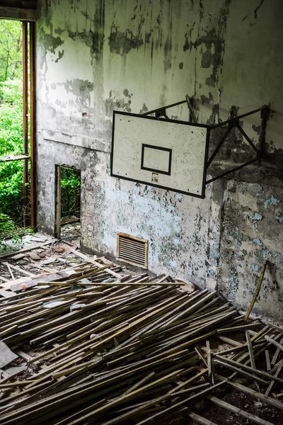 Gym in abandoned Pripyat school — Stock Photo, Image