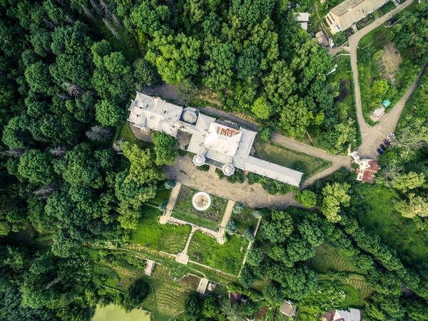 Beautiful aerial view on White Swan palace and yard in Sharivka park, Kharkiv region, Ukraine