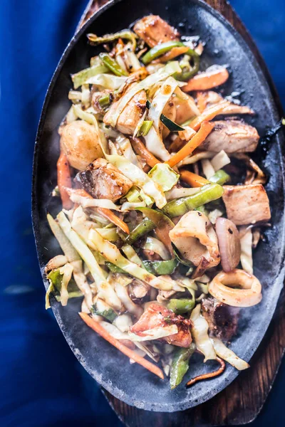 Roasted seafood with vegetables in pan — Stock Photo, Image