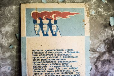 wall poster in abandoned school in Pripyat clipart
