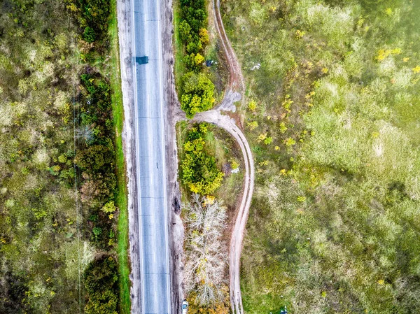 Track in countryside with rolled roads on one side — Stock Photo, Image