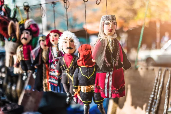 Dolls dressed in georgian national costumes — Stock Photo, Image