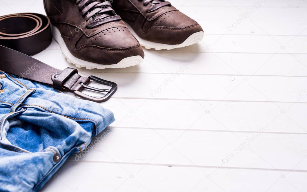 male jeans, belt and shoes with text space