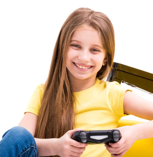女孩在玩电脑游戏玩控制台 — 图库照片