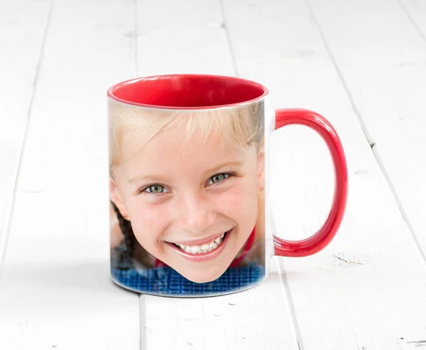 Simple cup red inside with girl printed — Stock Photo, Image