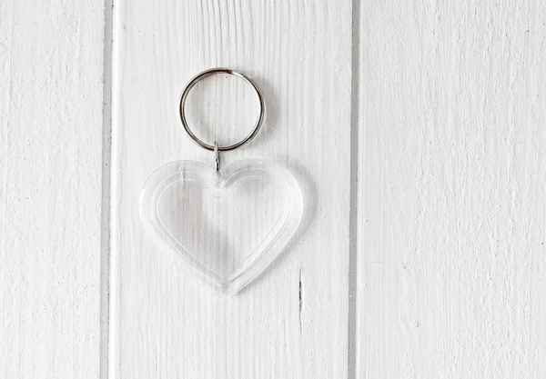 Transparent trinket in heart shape — Stock Photo, Image