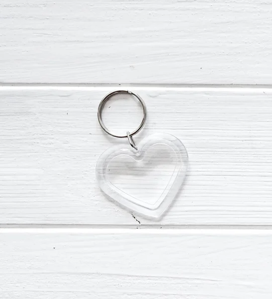 Transparent trinket in heart shape — Stock Photo, Image