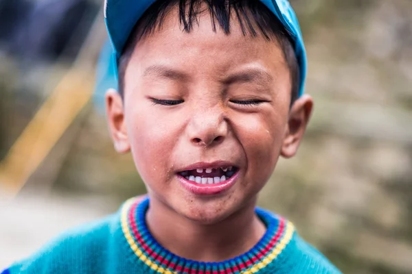 Portrait of young Nepalese boy, Annapurna track. — Stock Image Portrait of young Nepalese boy, Annapurna track. Stock Photo