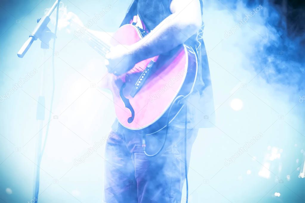 Frontman with guitar