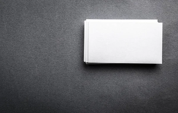 Blank white business card on grey background — Stock Photo, Image