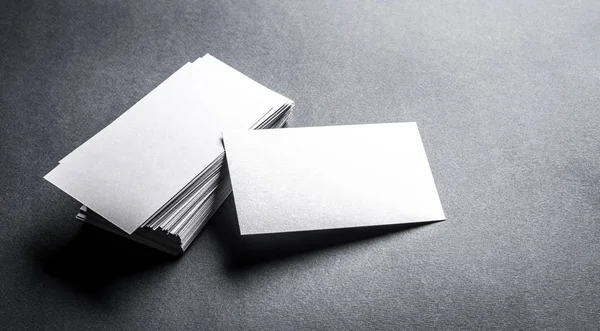 Blank white business card on grey background — Stock Photo, Image